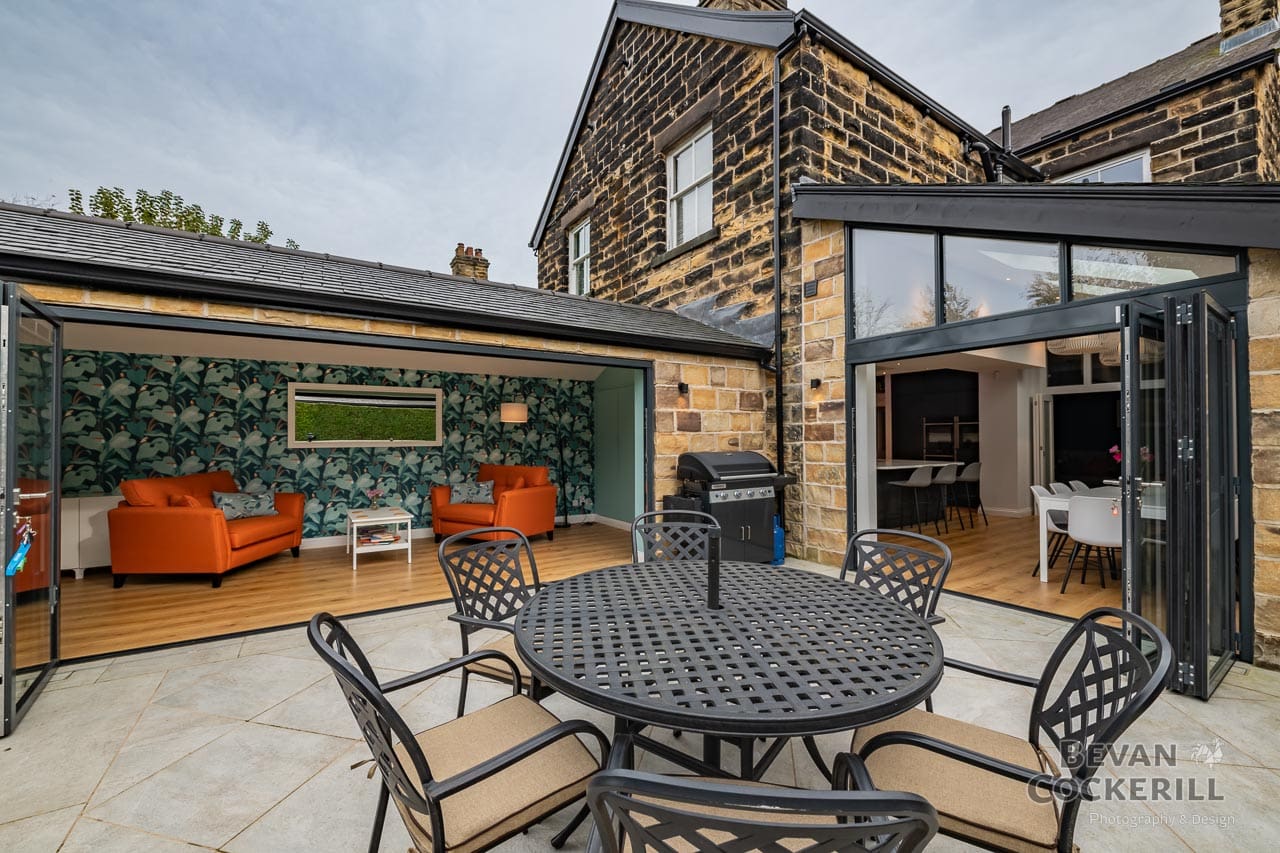 Kitchen Extension - Builders Photos by Bevan Cockerill from patio looking in through bi-folding doors